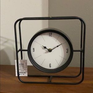Black rod iron clock